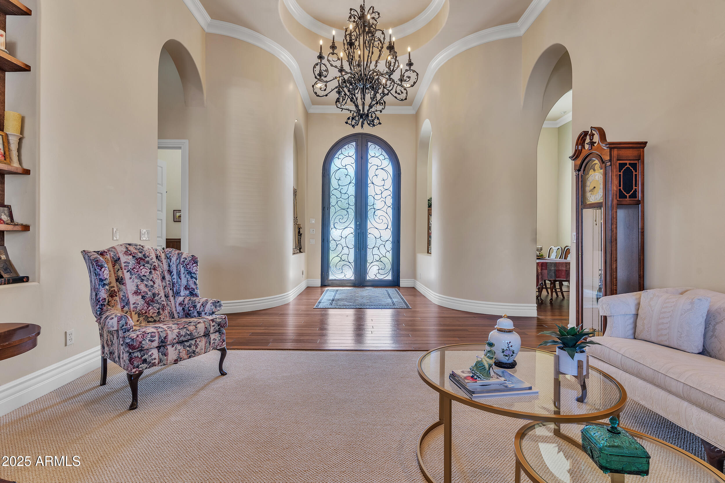 7172 Gelding Lane Coolidge, AZ 85128 - Photo 5 of 45 a living room with furniture and a chandelier