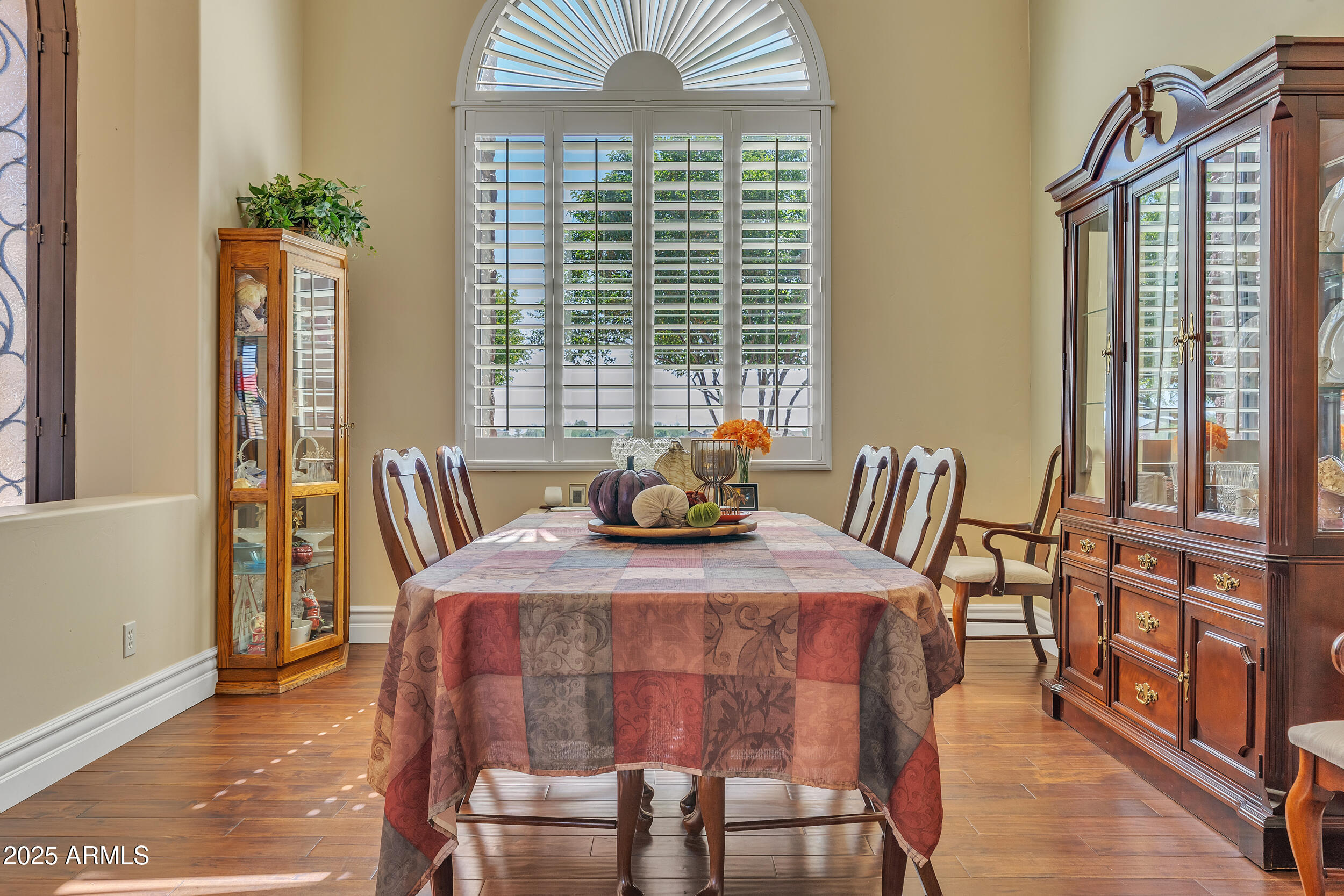 7172 Gelding Lane Coolidge, AZ 85128 - Photo 8 of 45 a bedroom with a bed and large windows