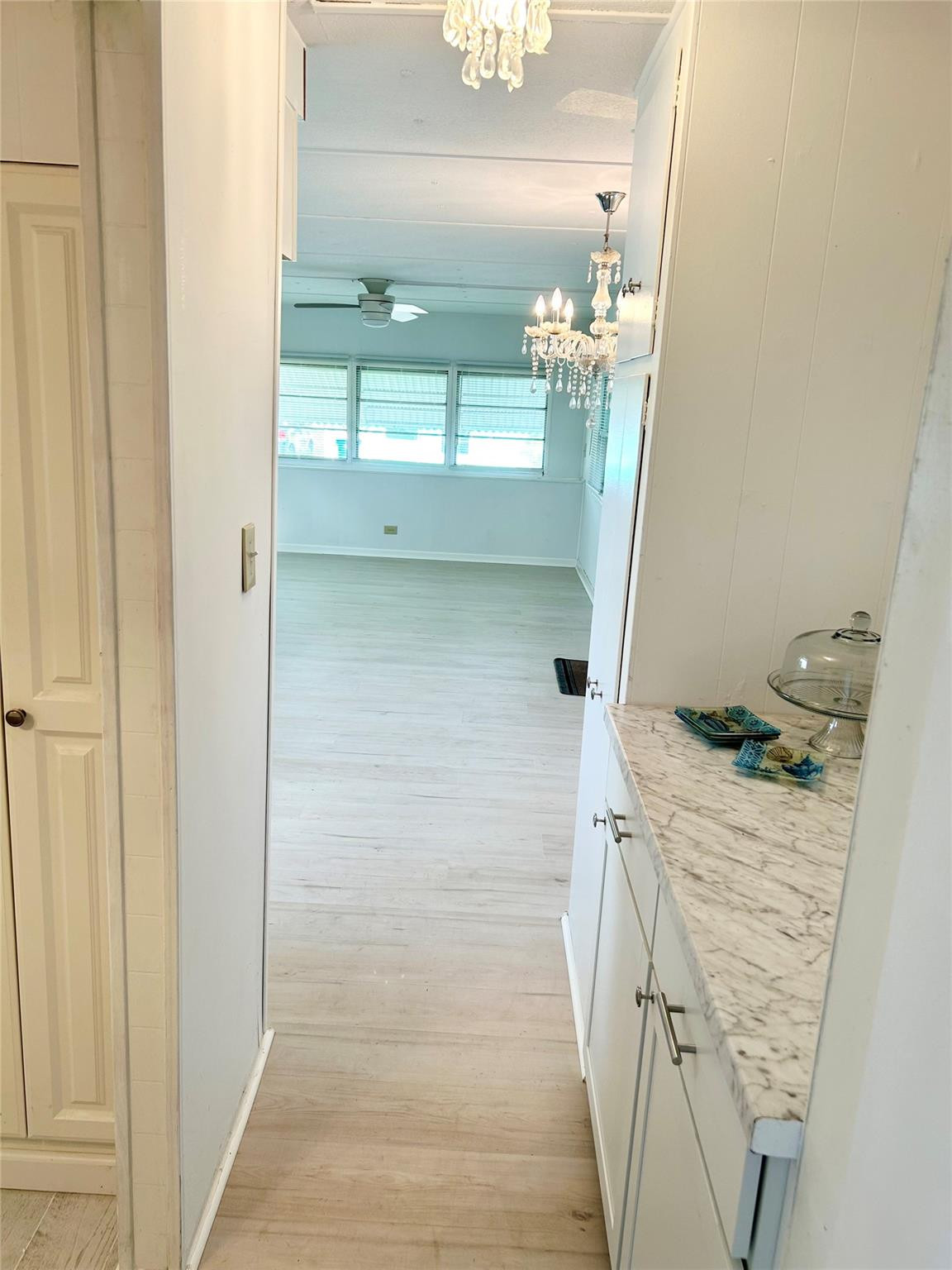 5400 Southeast Jack Avenue Stuart, FL 34997 - Photo 14 of 20 a bathroom with a sink and mirror