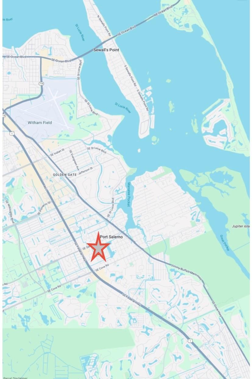 5400 Southeast Jack Avenue Stuart, FL 34997 - Photo 16 of 20 a vase of flowers sitting on a table