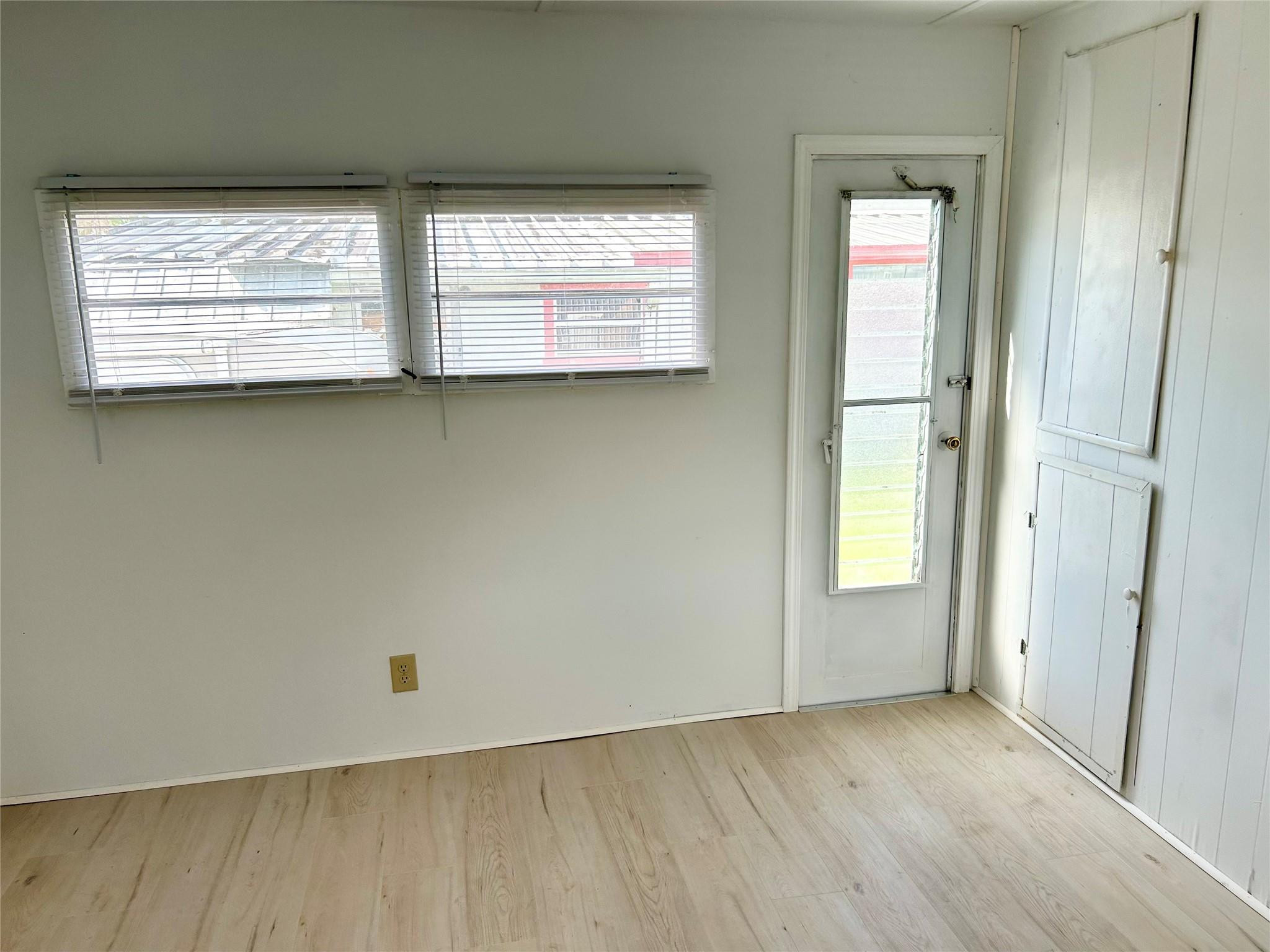 5400 Southeast Jack Avenue Stuart, FL 34997 - Photo 8 of 20 an empty room with windows