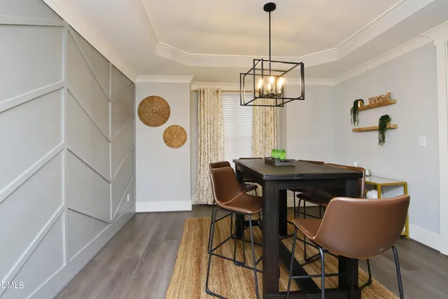 a living room with fireplace furniture and a flat screen tv
