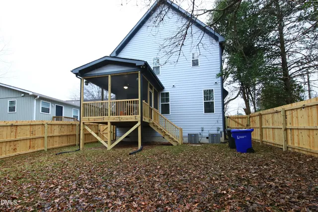 a view of backyard and tree