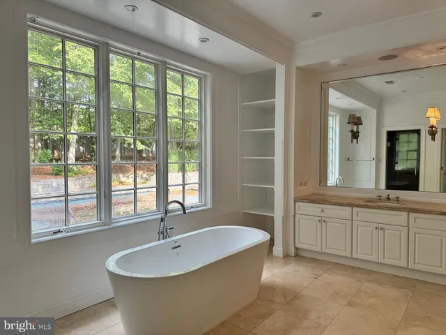a view of entryway with wooden floor and stairs
