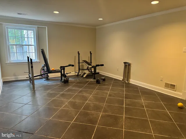 a view of a hallway with staircase