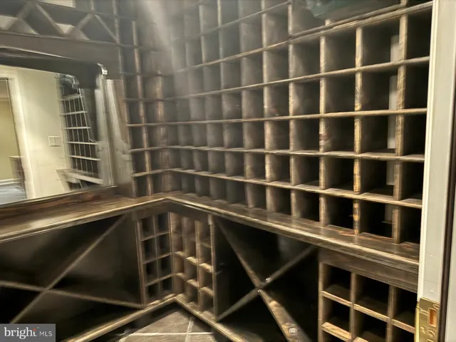 a room with appliances cabinets and a sink