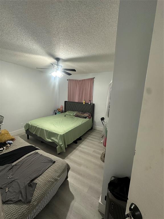 3111 Thames Way Miramar, FL 33025 - Photo 15 of 18 a room with a bed and a chair