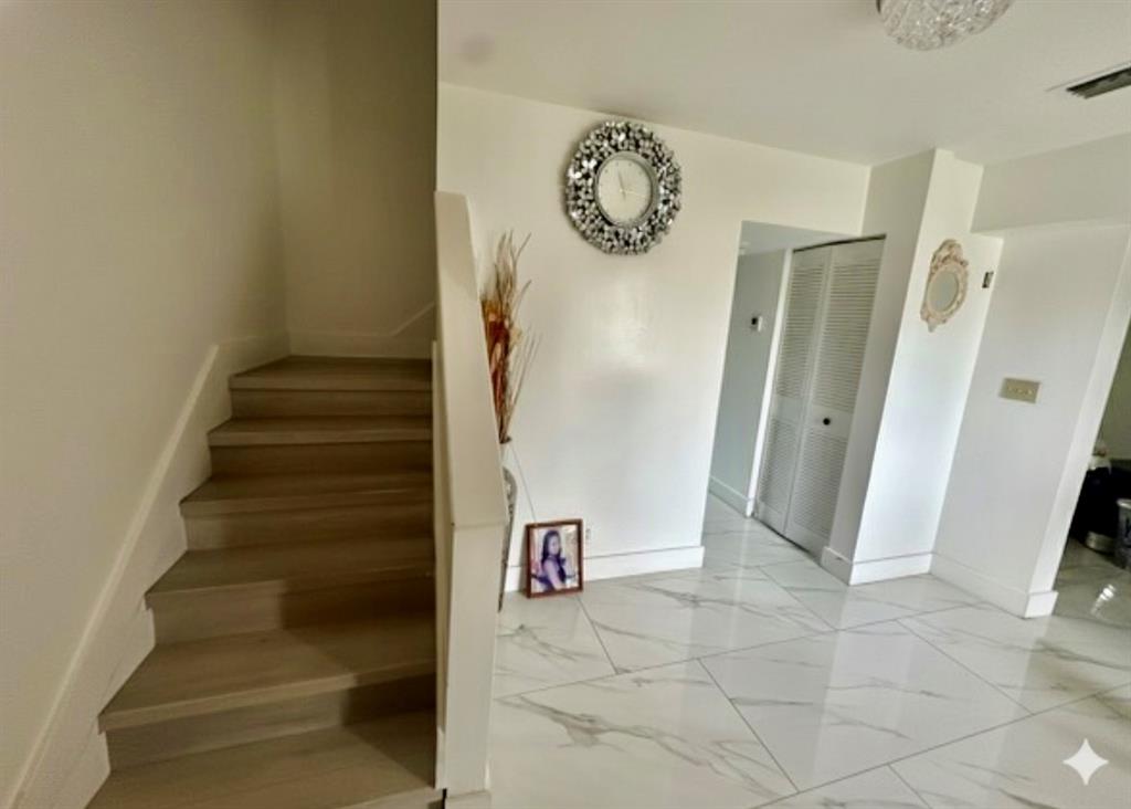 3111 Thames Way Miramar, FL 33025 - Photo 5 of 18 a view of entryway with stairs and door
