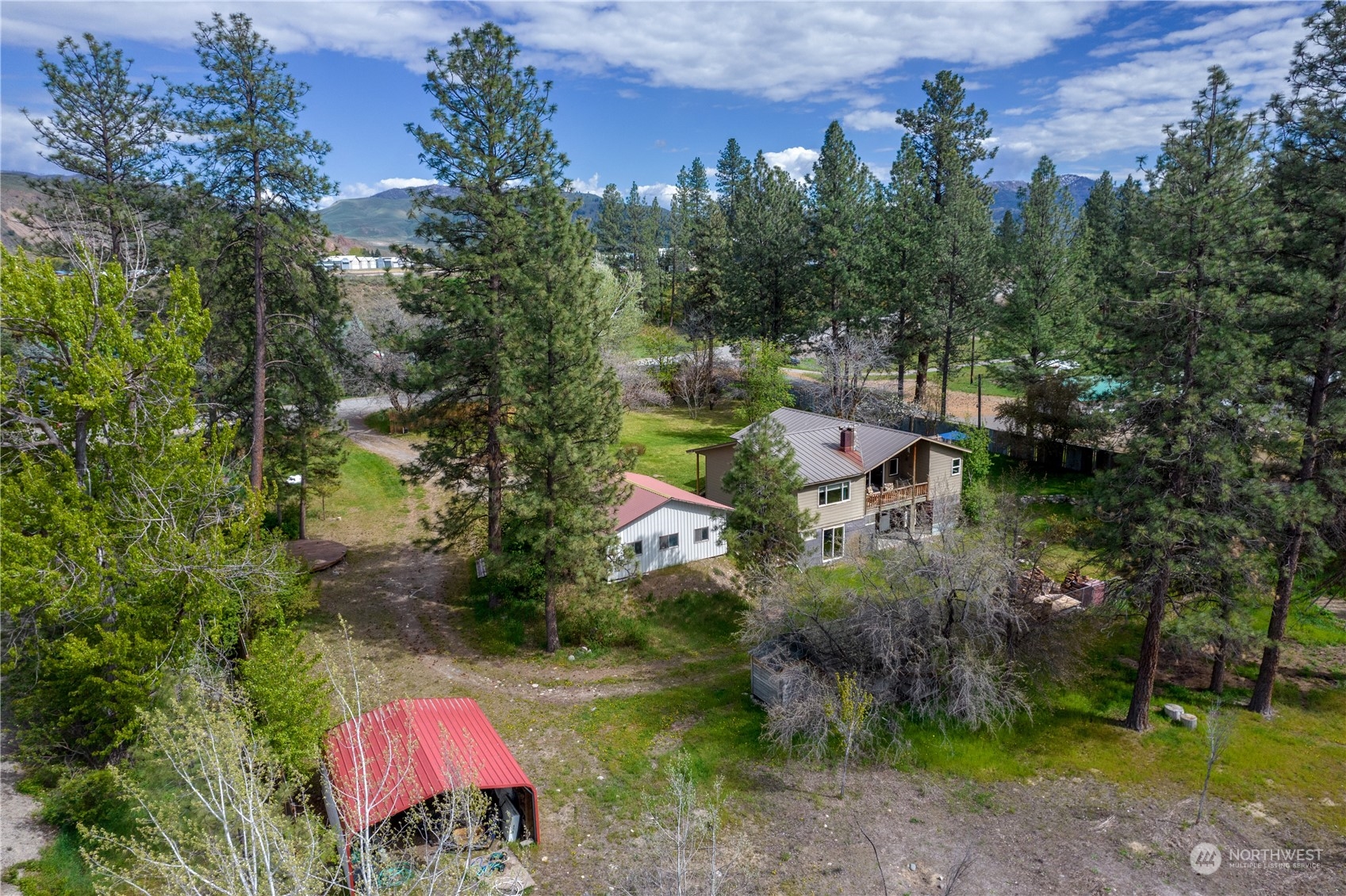 36 Twisp Airport Road Twisp, WA 98856 - Photo 7 of 38 an aerial view of residential house with outdoor space and street view
