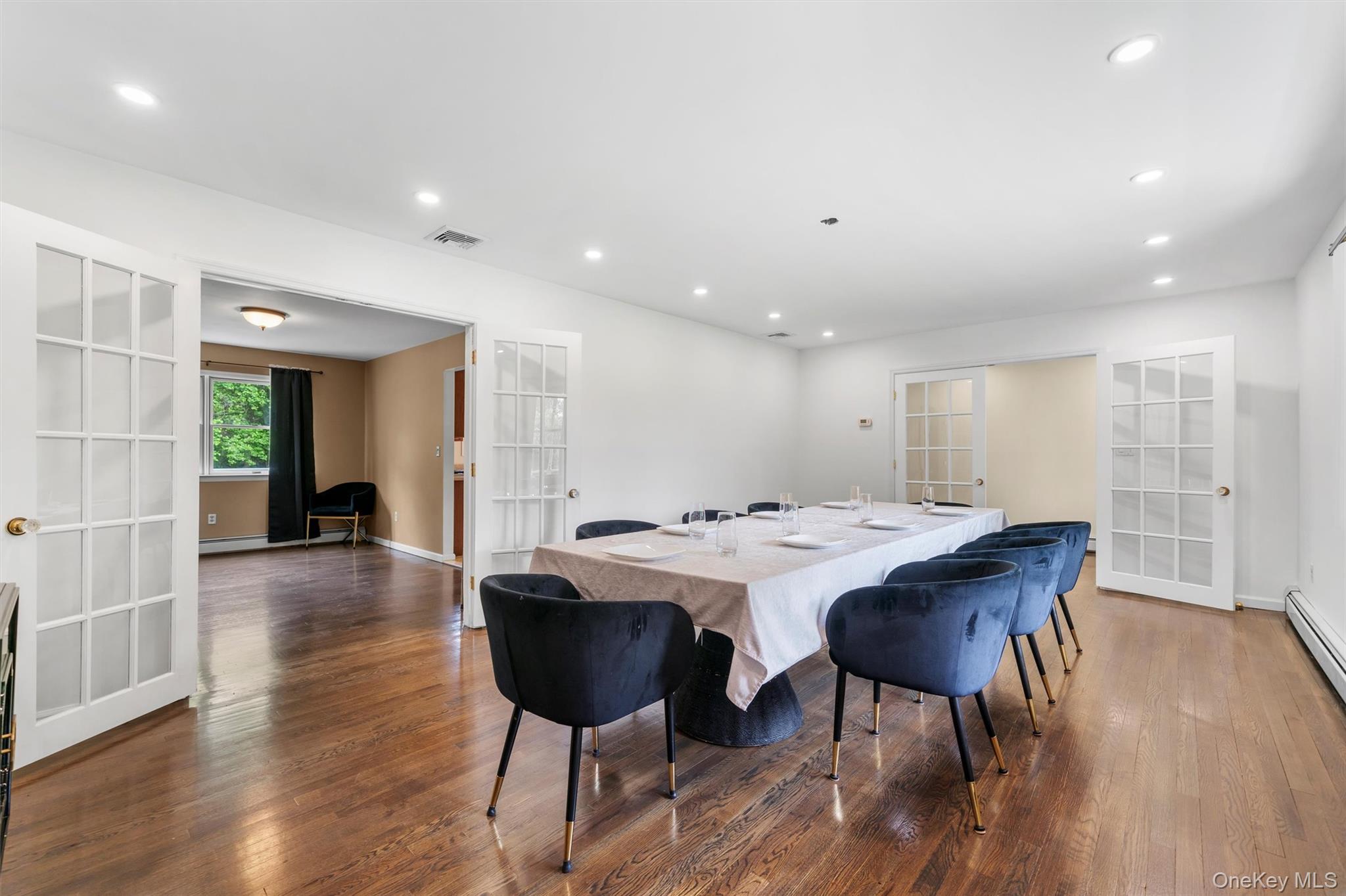 14 Cheesecote Court Stony Point, NY 10980 - Photo 12 of 40 a view of a dining room with furniture wooden floor and chandelier