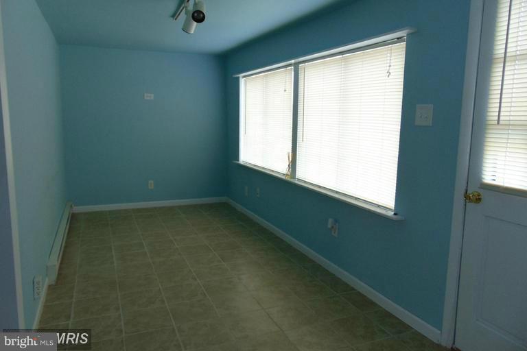 2262 Monocacy Road Essex, MD 21221 - Photo 14 of 18 Heated Porch--Overlooks Decks-Pier-Water