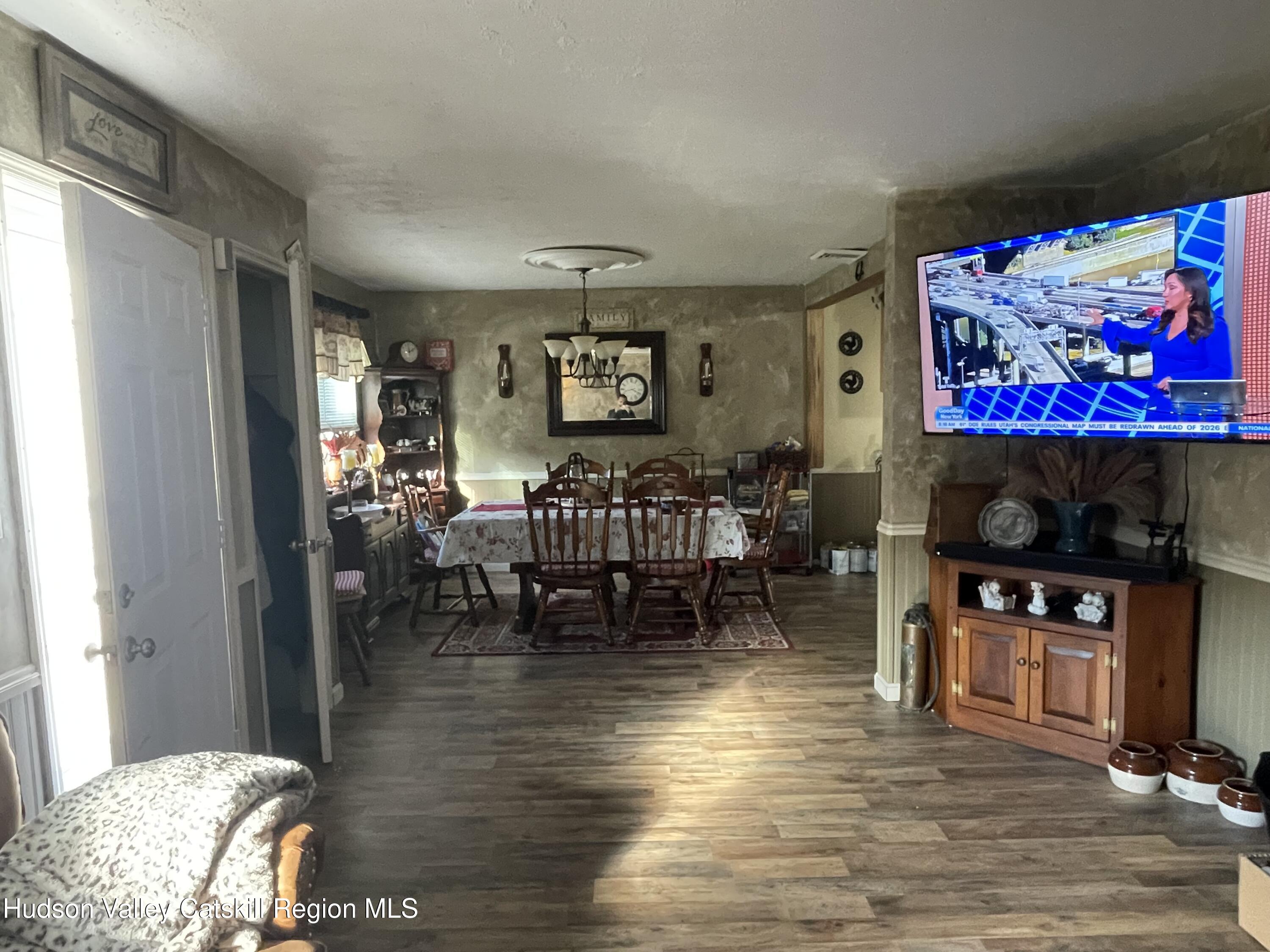 10 Johns Road Kerhonkson, NY 12446 - Photo 12 of 30 a living room with furniture and a flat screen tv