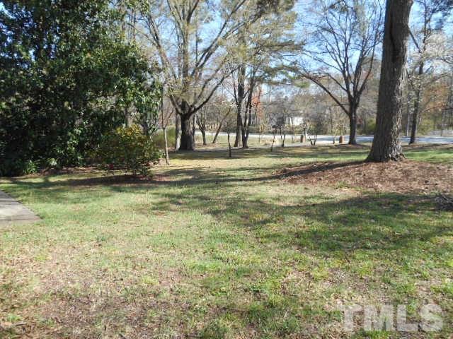 6591 Dwight Rowland Road Willow Spring, NC 27592 - Photo 11 of 16 a view of yard with trees
