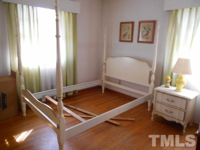 6591 Dwight Rowland Road Willow Spring, NC 27592 - Photo 16 of 16 a room with pool table and window