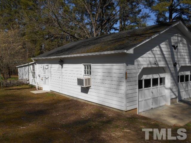6591 Dwight Rowland Road Willow Spring, NC 27592 - Photo 6 of 16 a view of back yard of the house