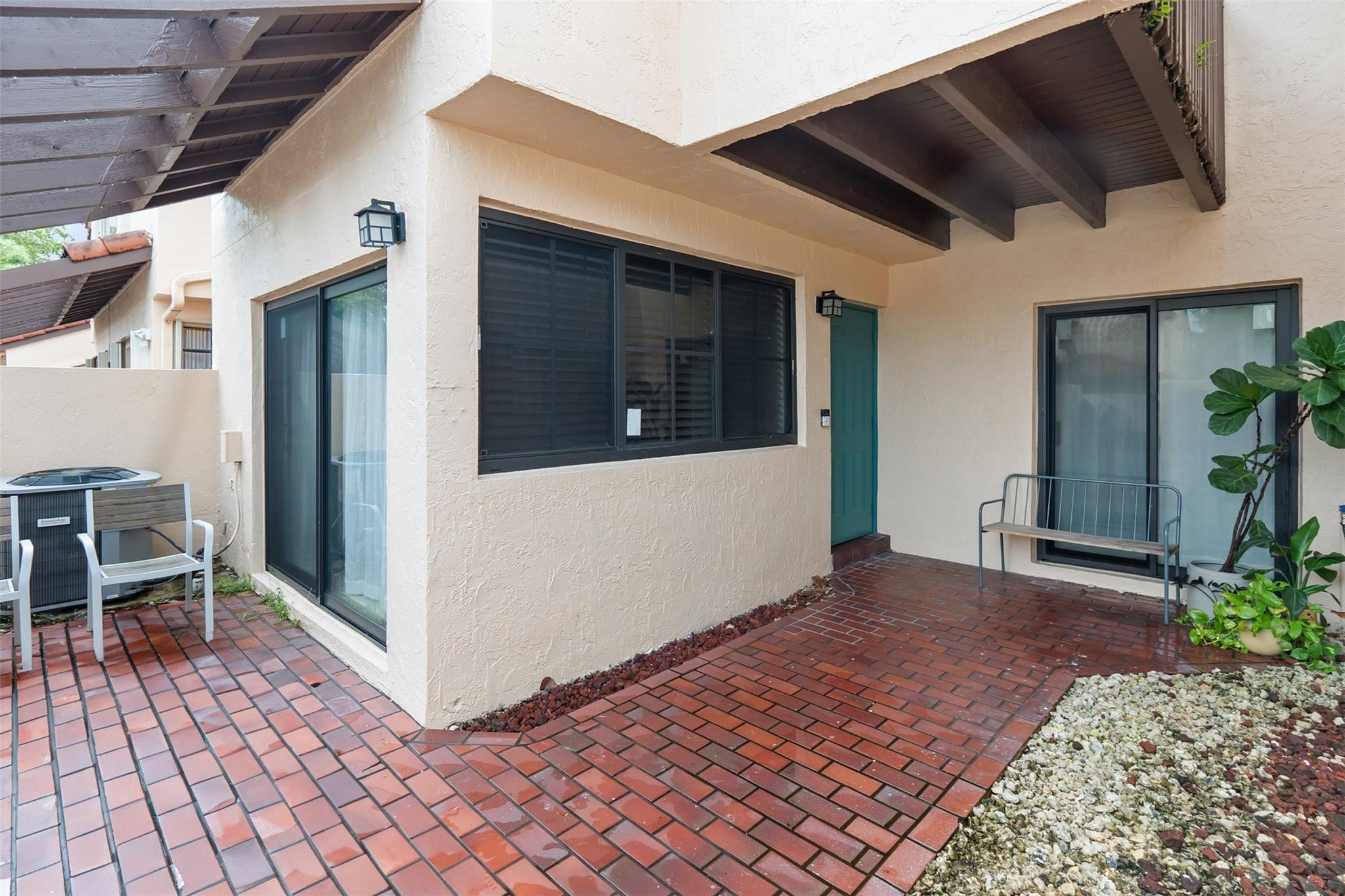 13278 Southwest 114th Terrace, Unit 13278 Miami, FL 33186 - Photo 16 of 35 a view of a porch