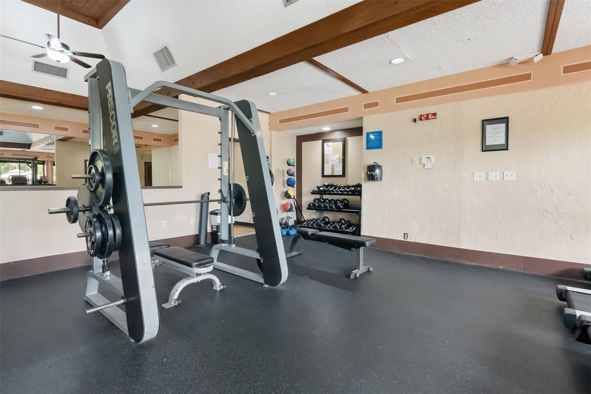 13278 Southwest 114th Terrace, Unit 13278 Miami, FL 33186 - Photo 22 of 35 a view of a room with gym equipment