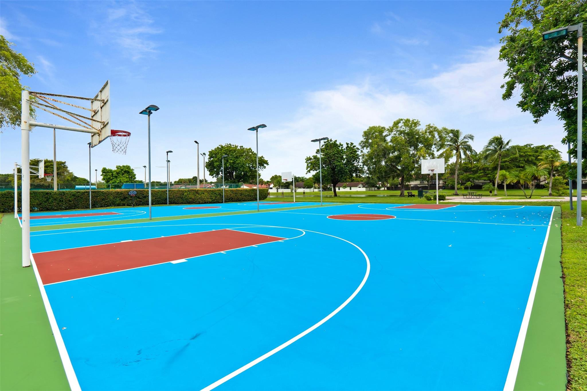 13278 Southwest 114th Terrace, Unit 13278 Miami, FL 33186 - Photo 27 of 35 a view of a tennis court