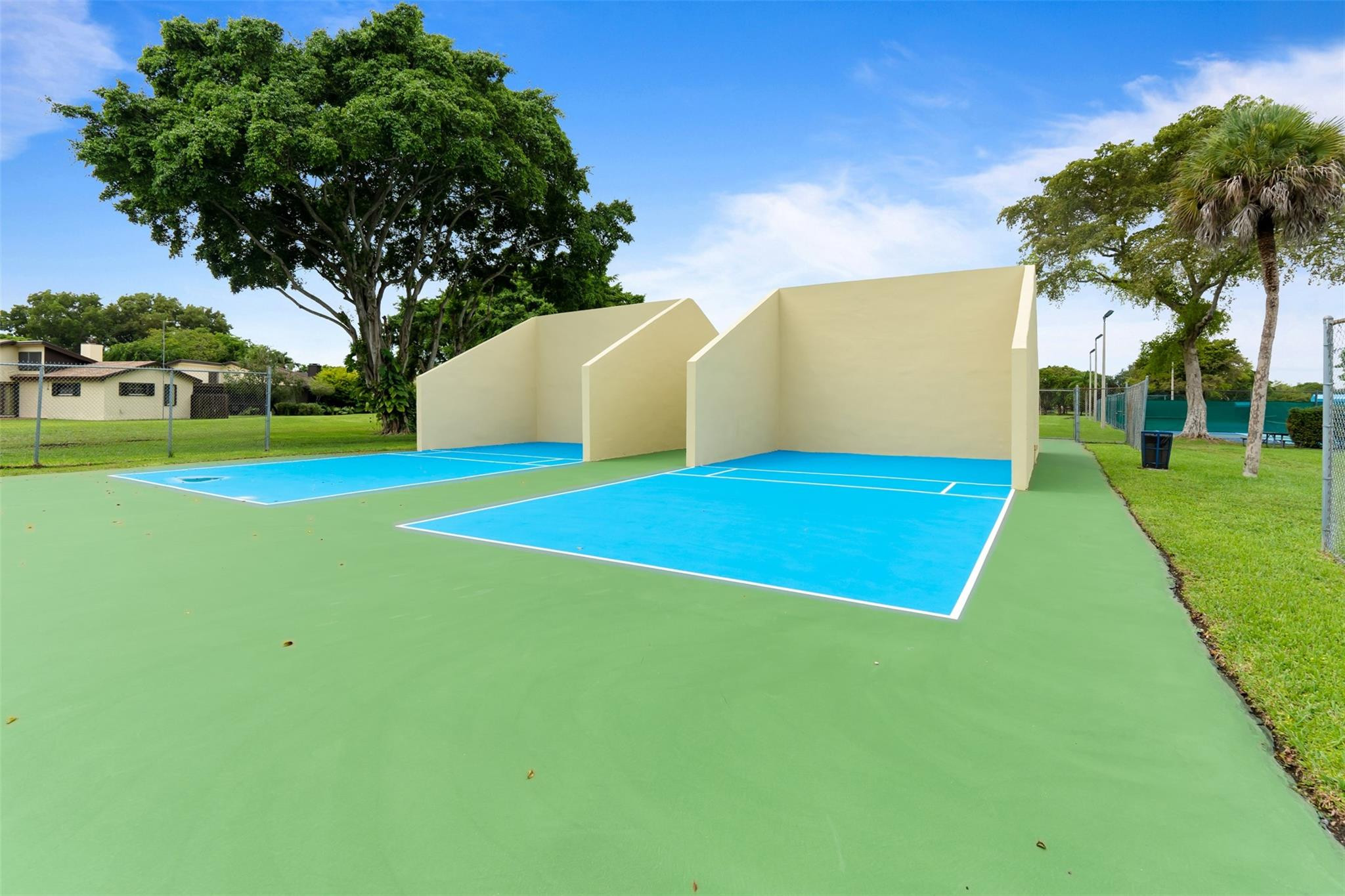 13278 Southwest 114th Terrace, Unit 13278 Miami, FL 33186 - Photo 28 of 35 a view of an outdoor space and basketball court