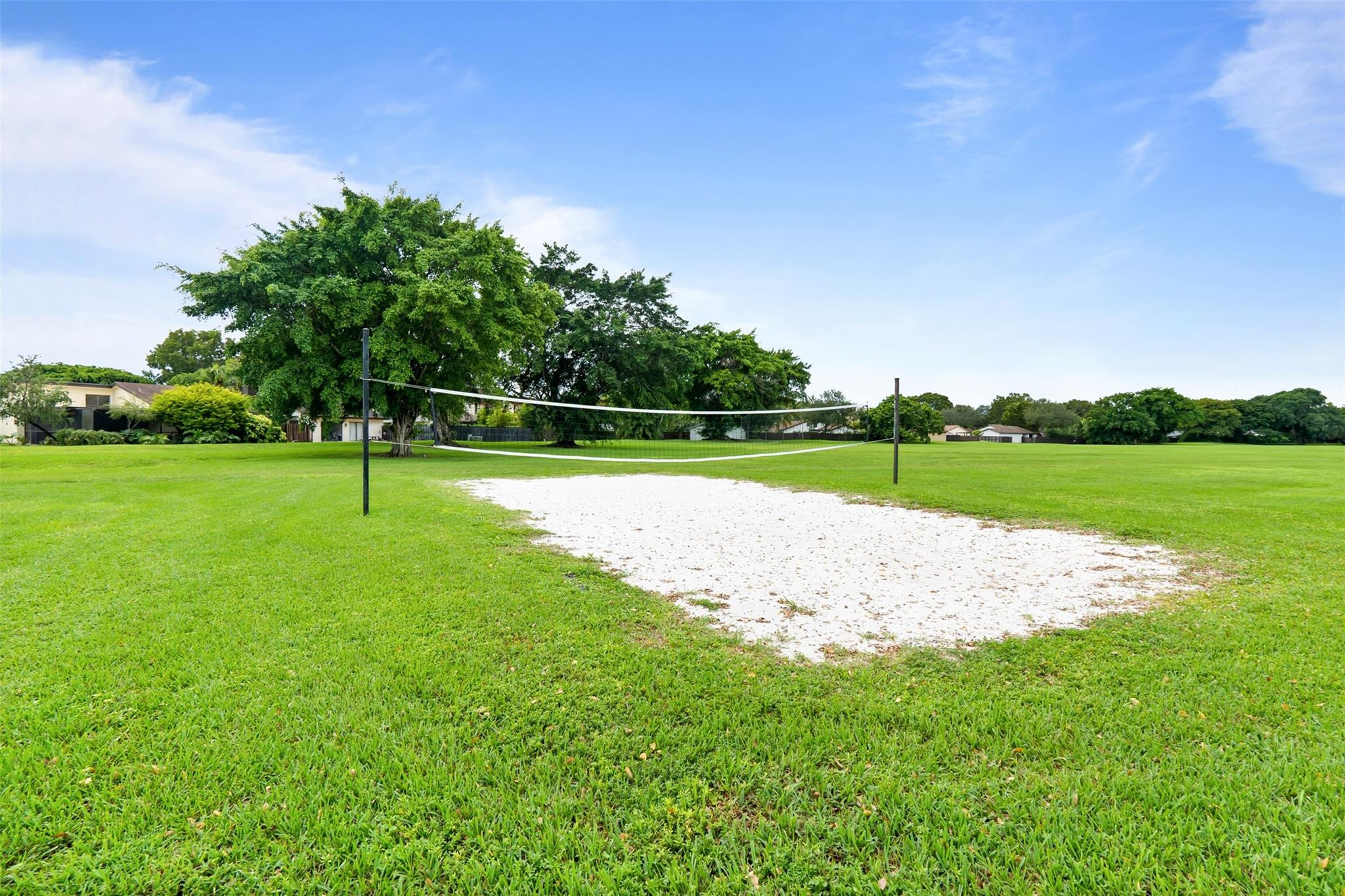13278 Southwest 114th Terrace, Unit 13278 Miami, FL 33186 - Photo 30 of 35 a view of a park and trees in the background