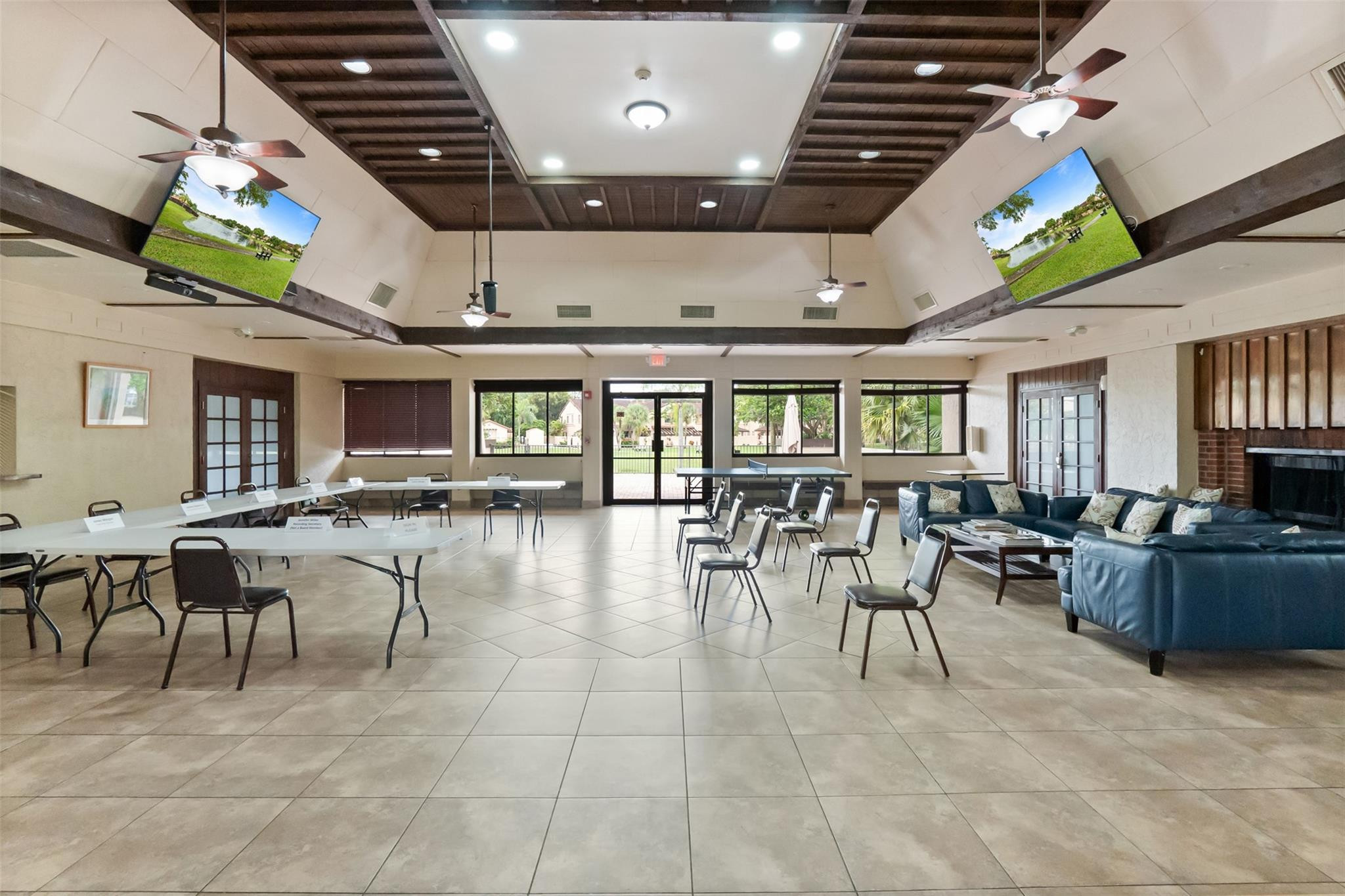 13278 Southwest 114th Terrace, Unit 13278 Miami, FL 33186 - Photo 34 of 35 a dining hall with lots of tables and chairs