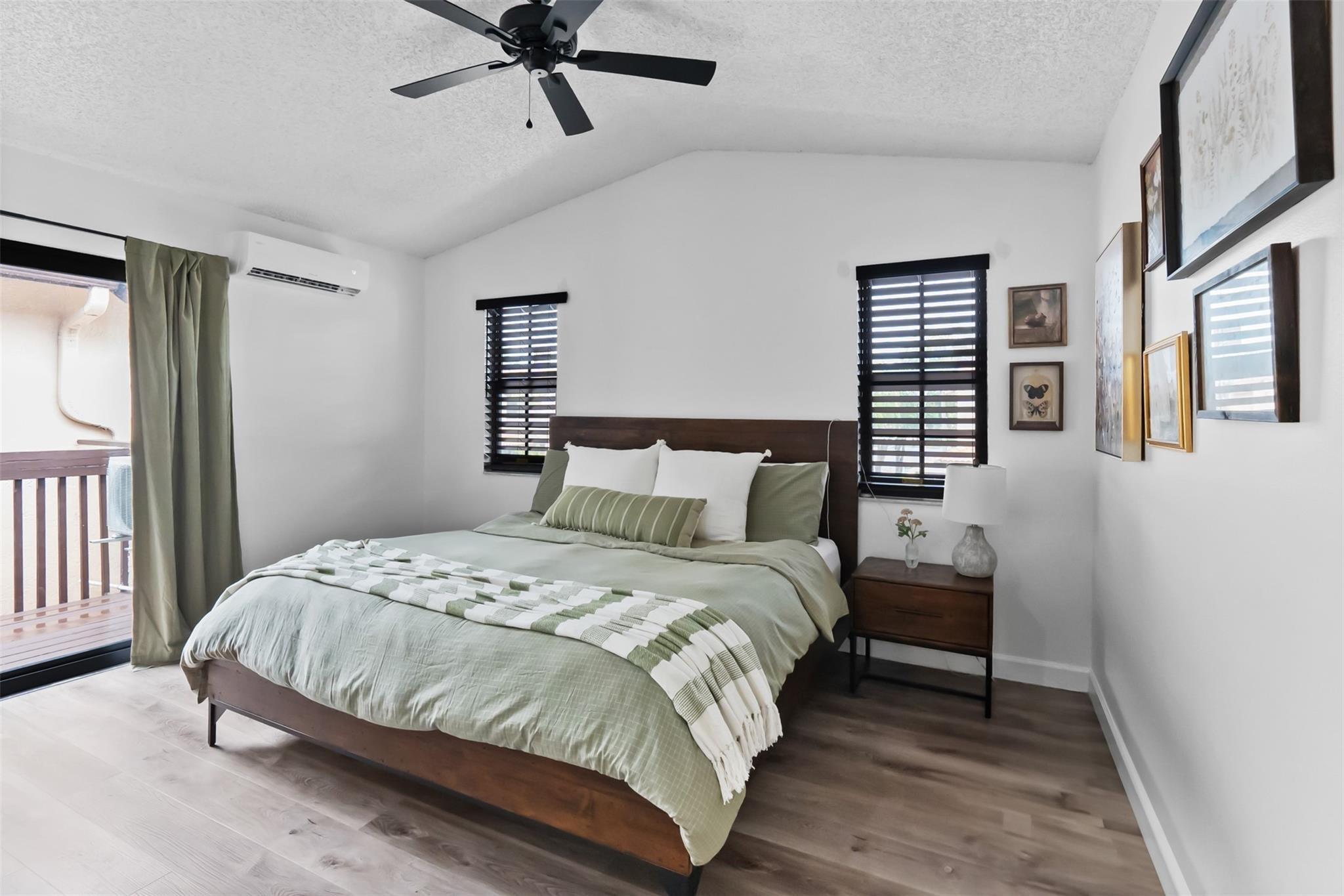 13278 Southwest 114th Terrace, Unit 13278 Miami, FL 33186 - Photo 8 of 35 a bedroom with a bed and a window