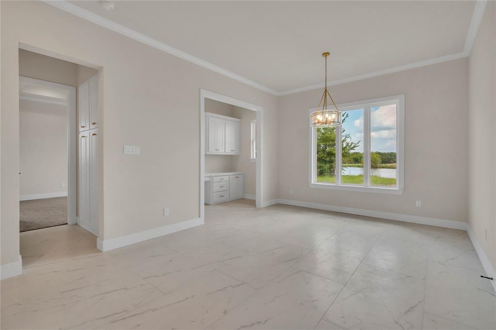 1028 Henry Way Springtown, TX 76082 - Photo 13 of 40 a view of an empty room with a window