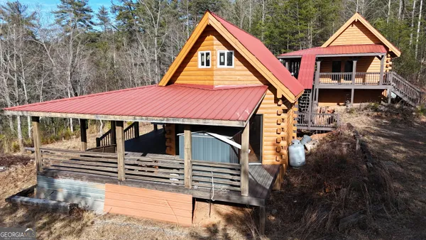 a front view of a house with yard