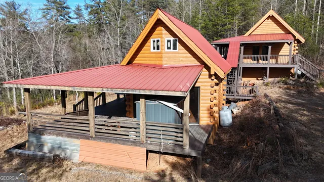 a front view of a house with yard