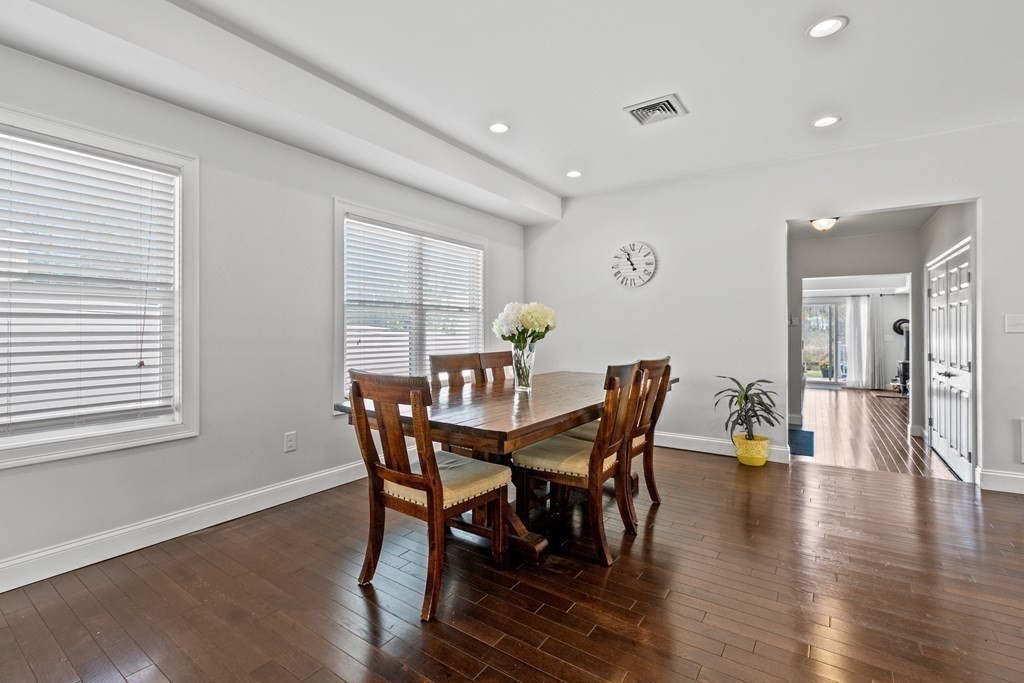 651 Nashua Road Dracut, MA 01826 - Photo 13 of 42 a view of a dining room with furniture window and wooden floor