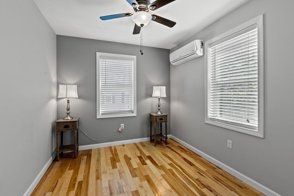 651 Nashua Road Dracut, MA 01826 - Photo 34 of 42 a view of a room with a window and wooden floor