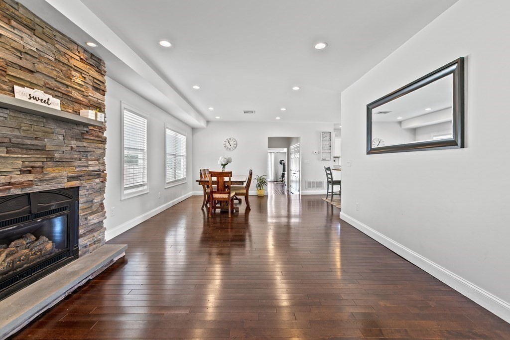651 Nashua Road Dracut, MA 01826 - Photo 5 of 42 a dining room with furniture and wooden floor