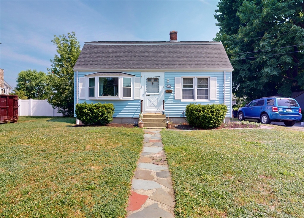 1205 Trapelo Road Waltham, MA 02451 - Photo 2 of 25 a front view of a house with garden