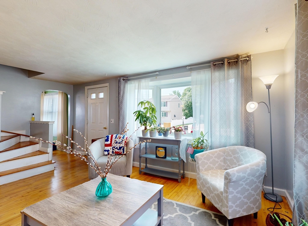 1205 Trapelo Road Waltham, MA 02451 - Photo 5 of 25 a living room with furniture and a fireplace