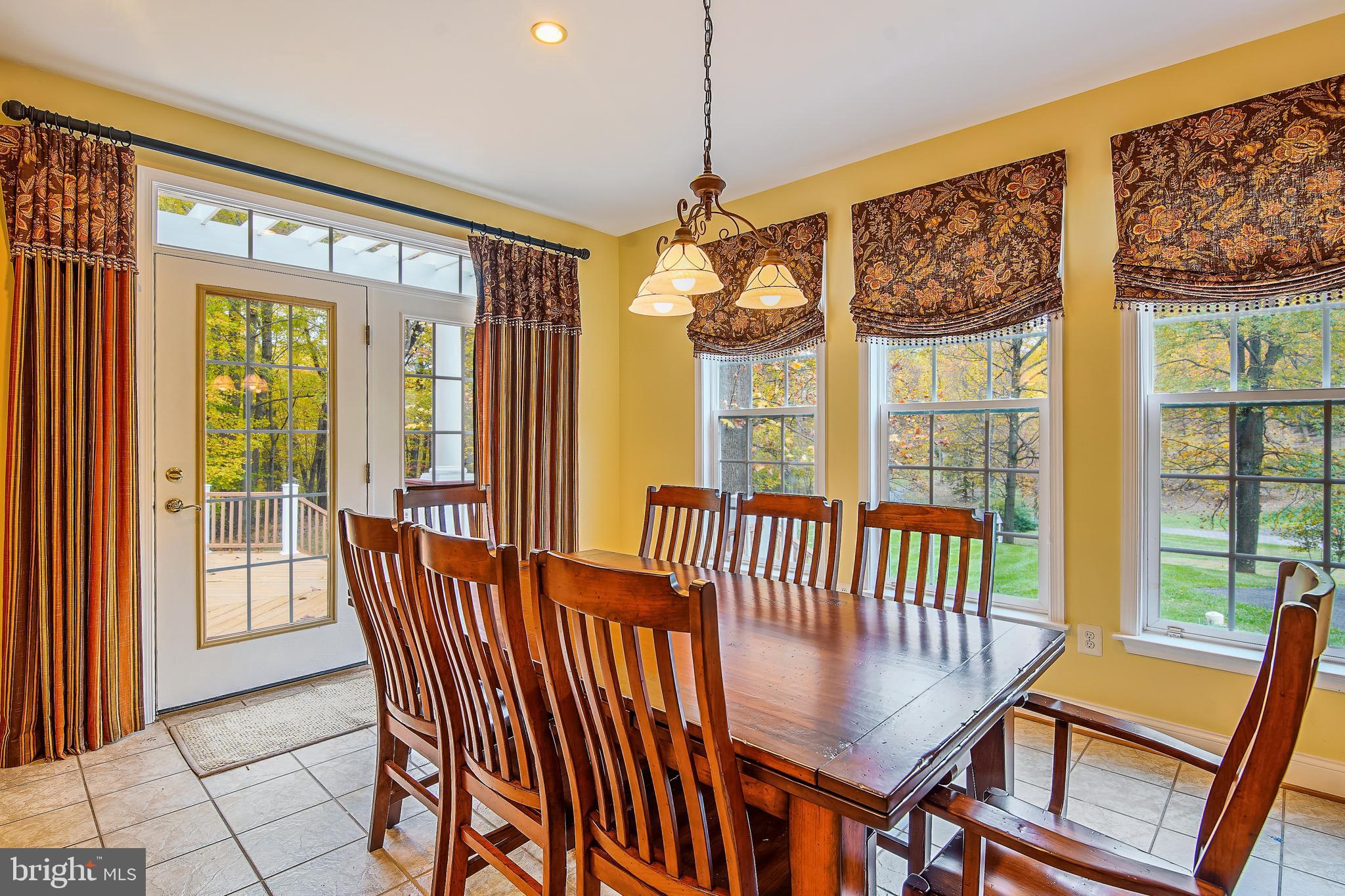 6661 South Clifton Road Frederick, MD 21703 - Photo 14 of 68 Breakfast area with door to deck