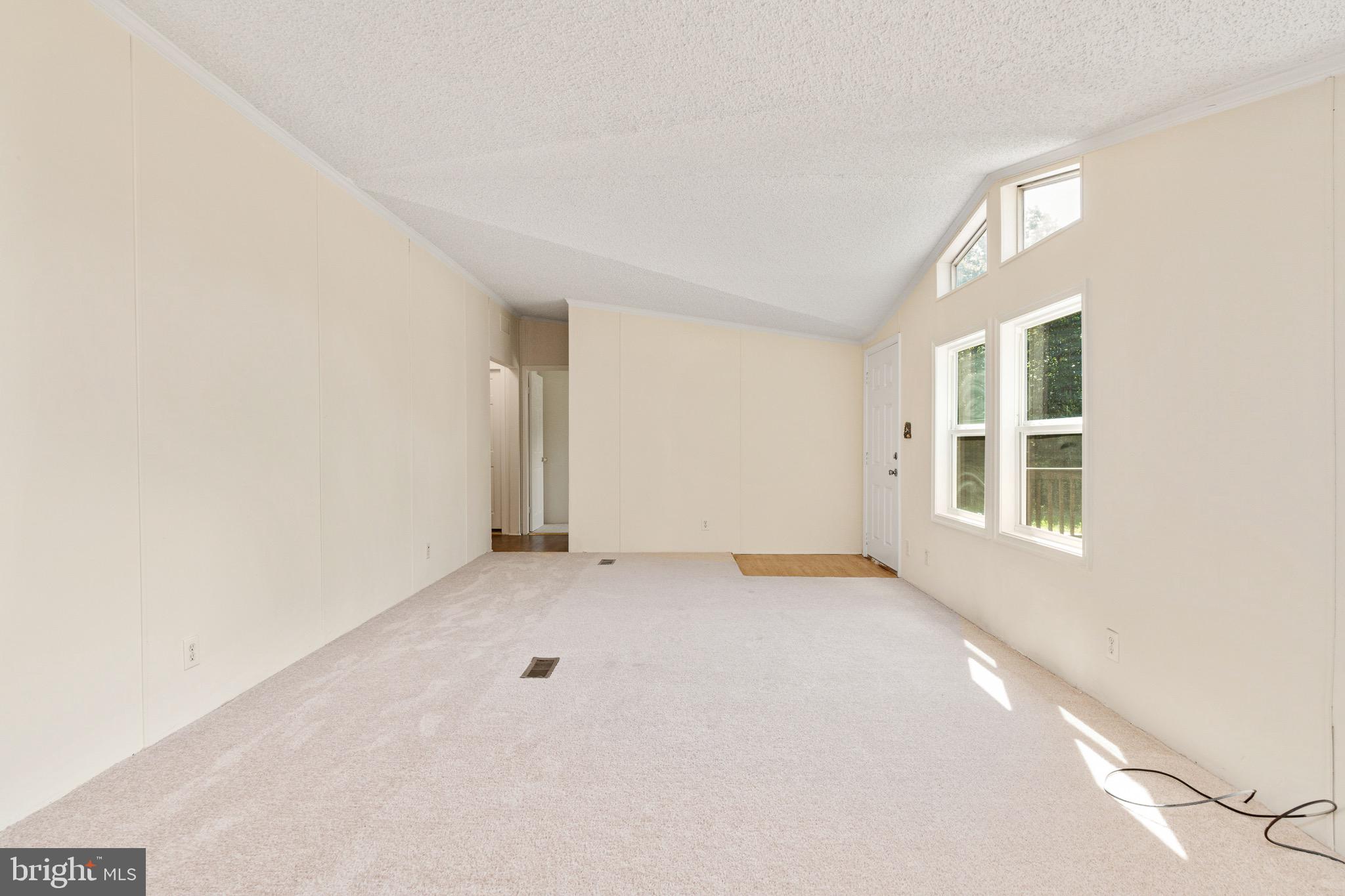 185 Deane Road Louisa, VA 23093 - Photo 17 of 42 an empty room with a window