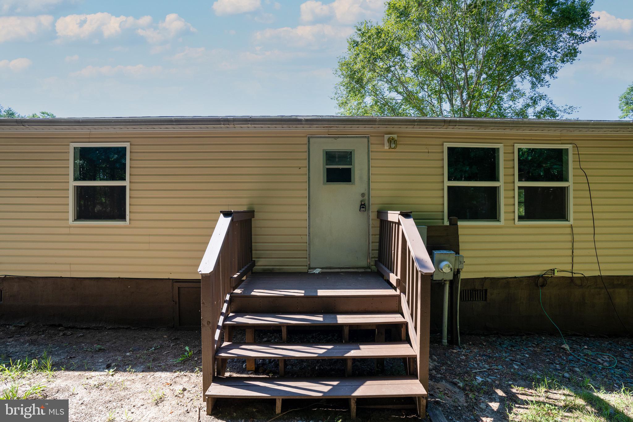 185 Deane Road Louisa, VA 23093 - Photo 3 of 42 a view of outdoor space with deck