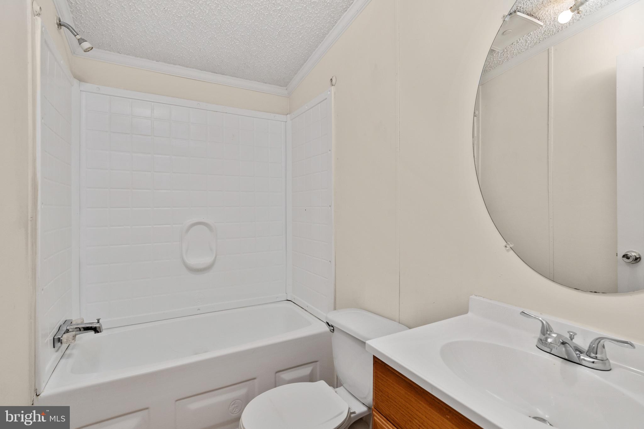 185 Deane Road Louisa, VA 23093 - Photo 27 of 42 a bathroom with a sink toilet and shower