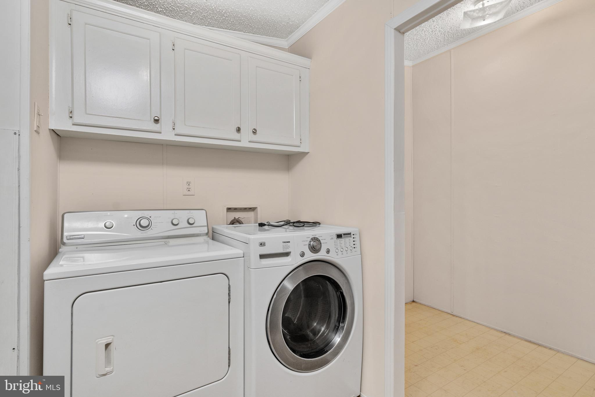 185 Deane Road Louisa, VA 23093 - Photo 41 of 42 a utility room with dryer and washer