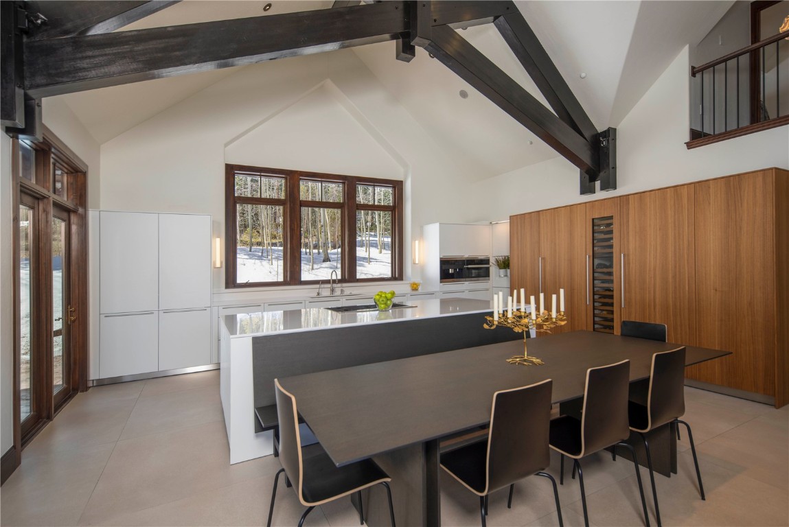 525 Two Cabins Drive Silverthorne, CO 80498 - Photo 11 of 35 a dining room with furniture and window