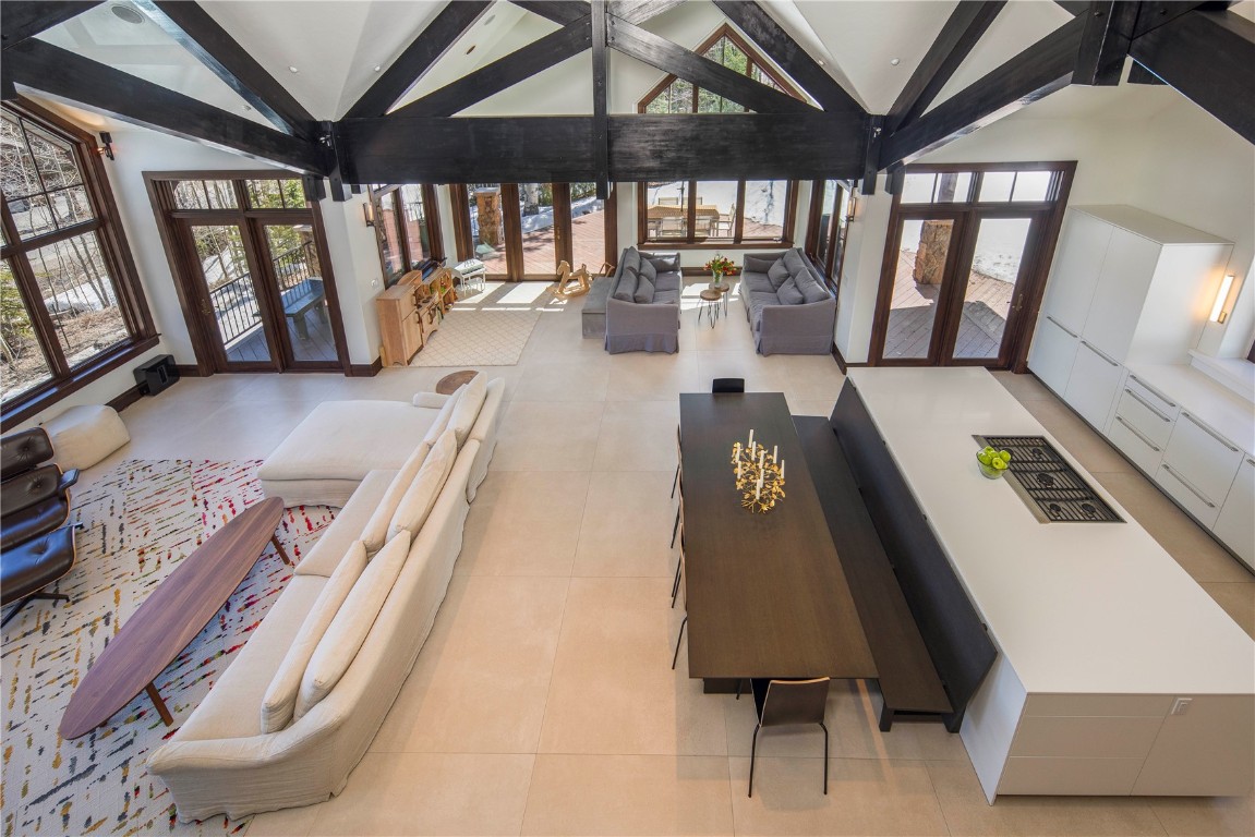 525 Two Cabins Drive Silverthorne, CO 80498 - Photo 14 of 35 a view of living room with furniture and floor to ceiling window
