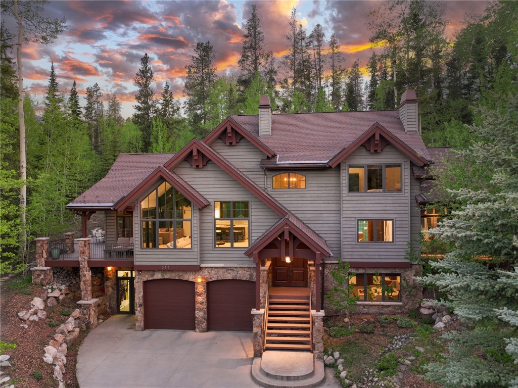 525 Two Cabins Drive Silverthorne, CO 80498 - Photo 15 of 35 a front view of a house with a garden and plants