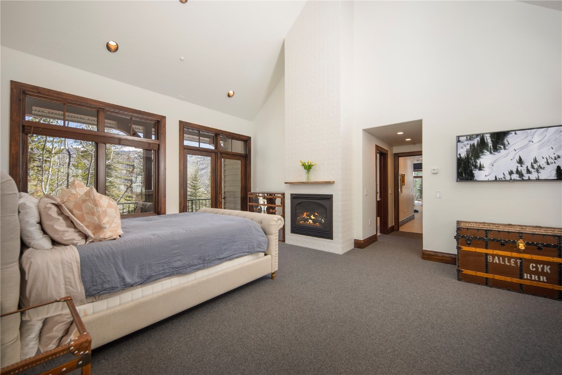 525 Two Cabins Drive Silverthorne, CO 80498 - Photo 17 of 35 a living room with furniture and a fireplace