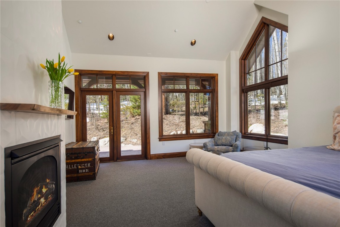 525 Two Cabins Drive Silverthorne, CO 80498 - Photo 18 of 35 a living room with furniture and a large window