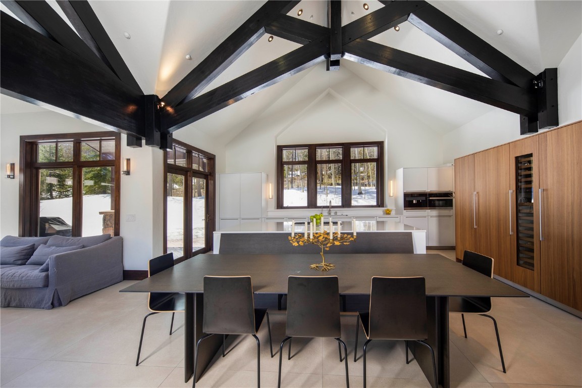 525 Two Cabins Drive Silverthorne, CO 80498 - Photo 2 of 35 a view of a dining room with furniture window and outside view