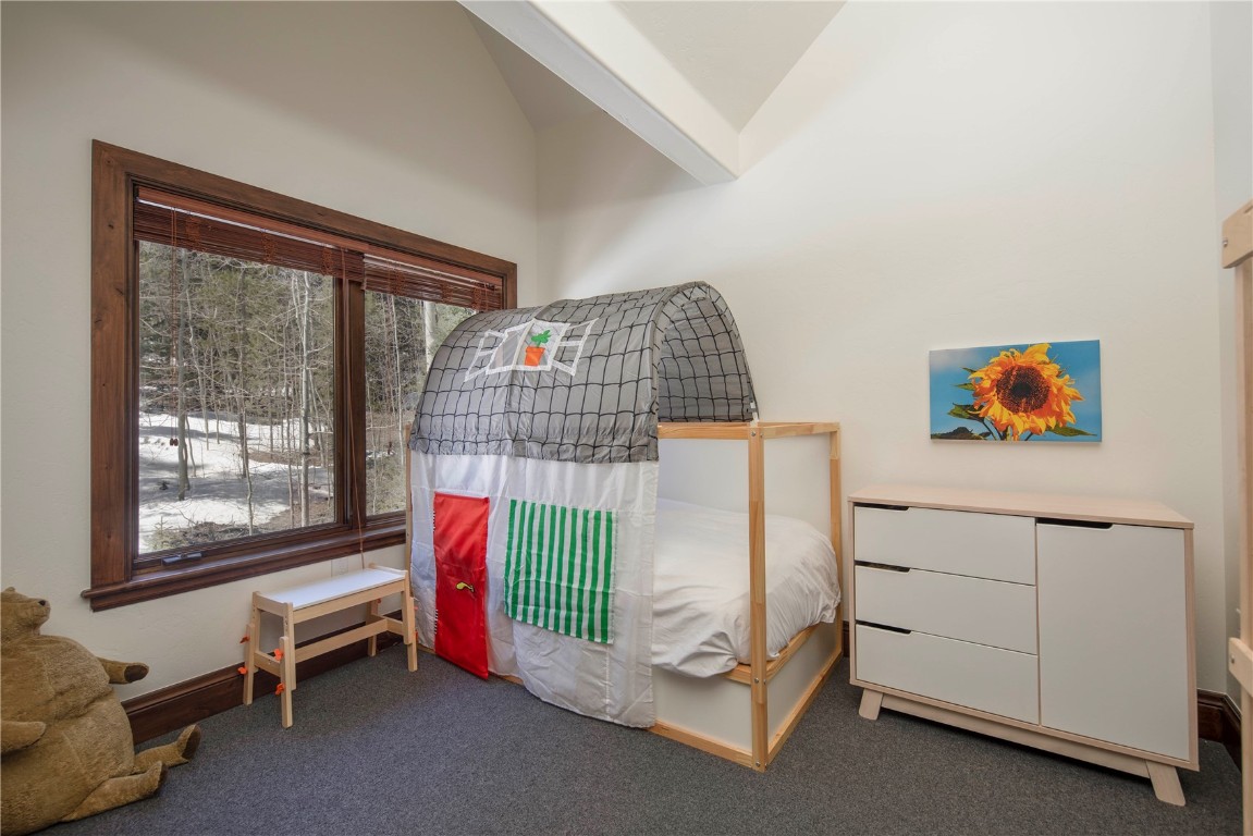 525 Two Cabins Drive Silverthorne, CO 80498 - Photo 28 of 35 a living room with furniture and a window