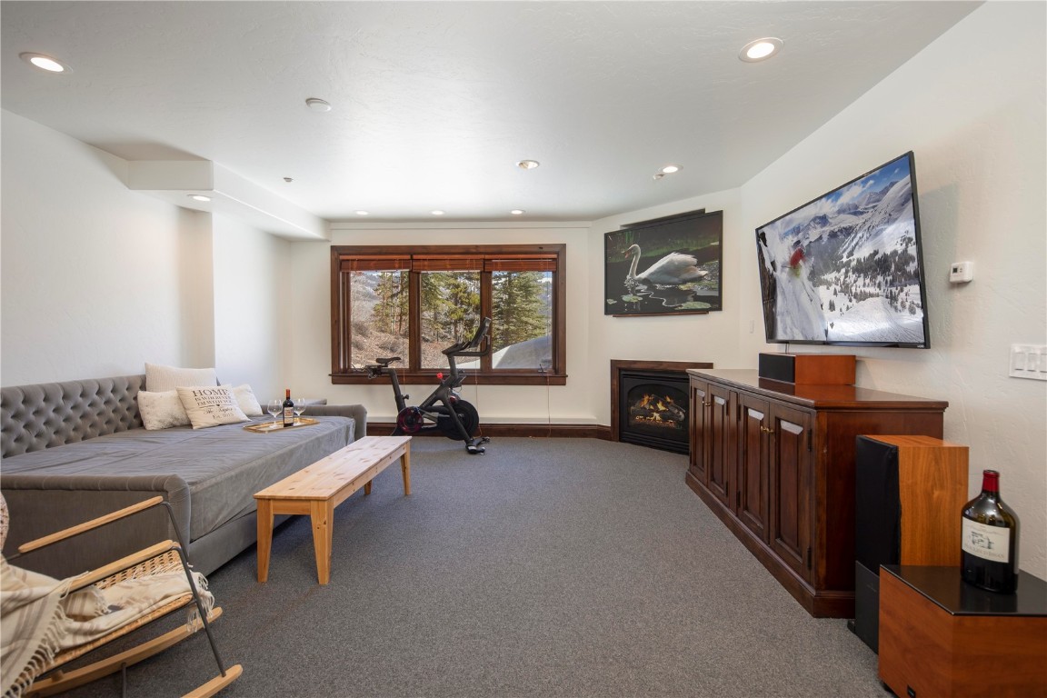 525 Two Cabins Drive Silverthorne, CO 80498 - Photo 29 of 35 a bedroom with furniture and a window
