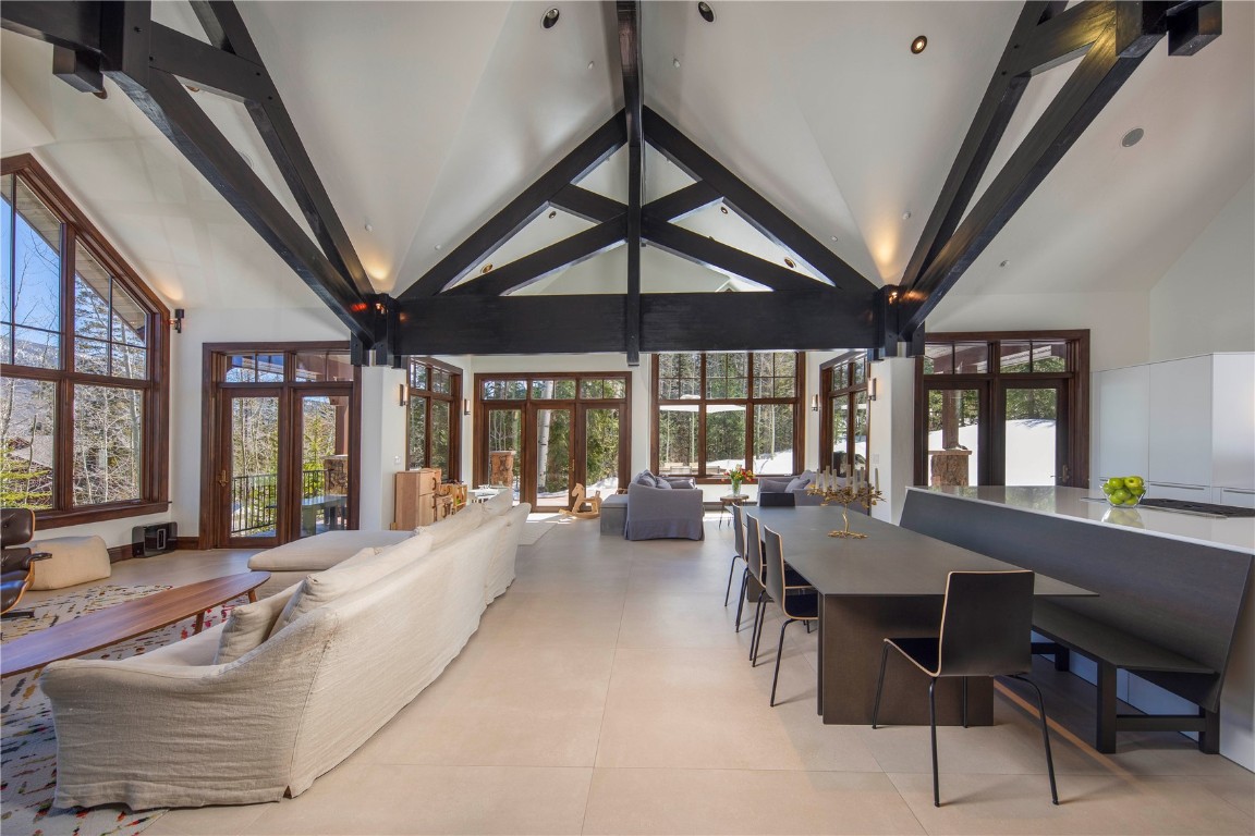 525 Two Cabins Drive Silverthorne, CO 80498 - Photo 8 of 35 a living room with furniture and large windows