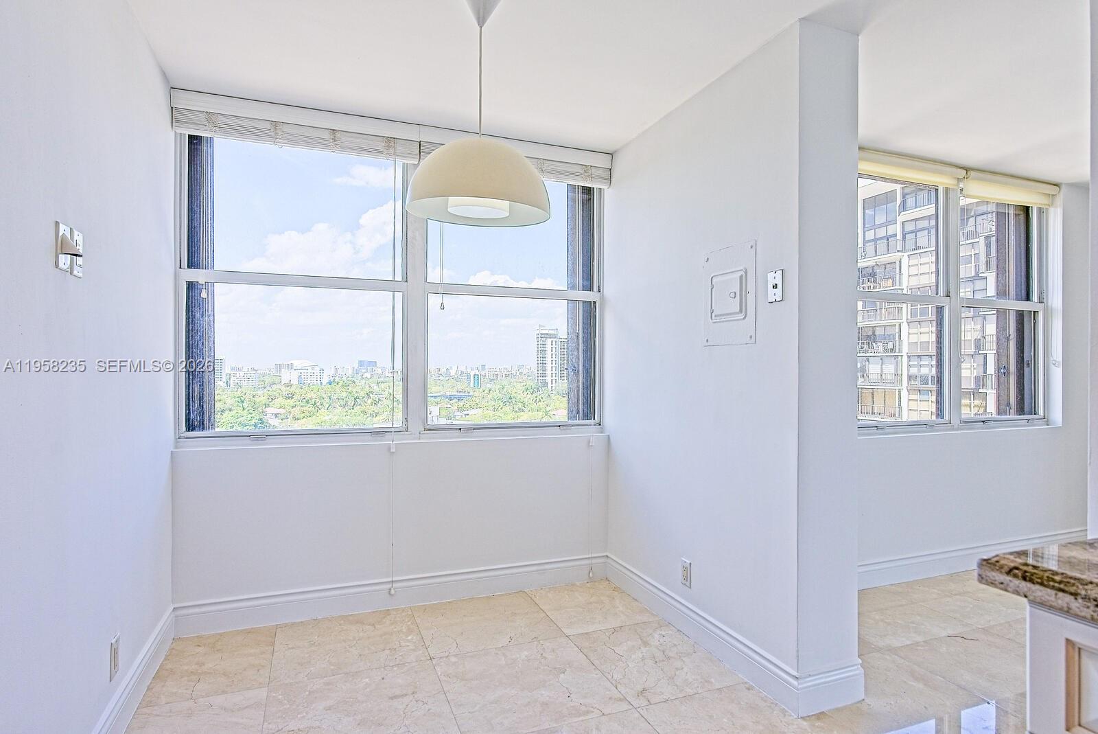 1925 Brickell Avenue, Unit D1201 Miami, FL 33129 - Photo 8 of 27 a view of an empty room with a window