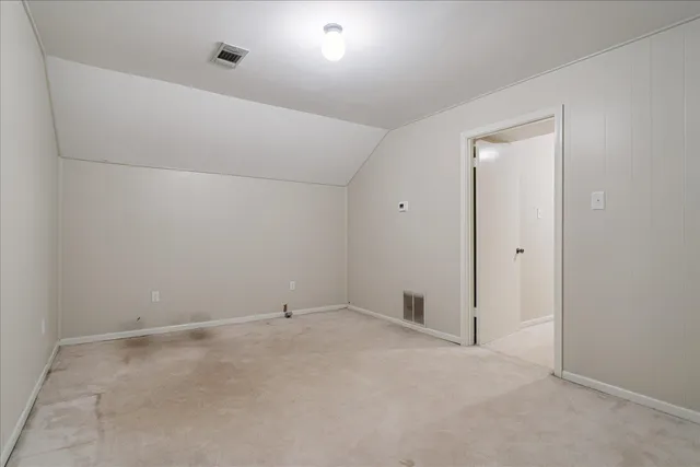 an empty room with an entryway